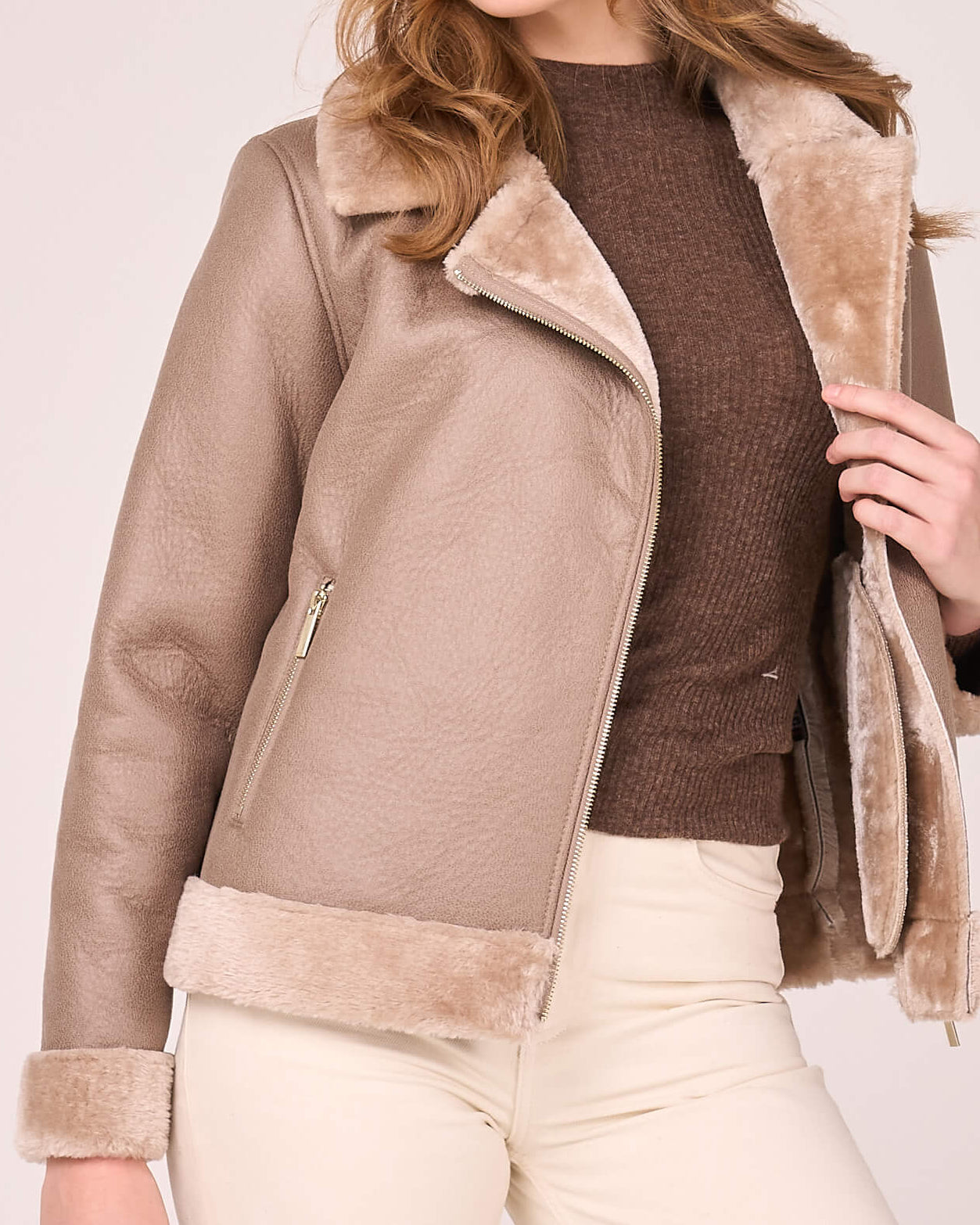 Close up detail image of faux shearling jacket by Barneys Originals.