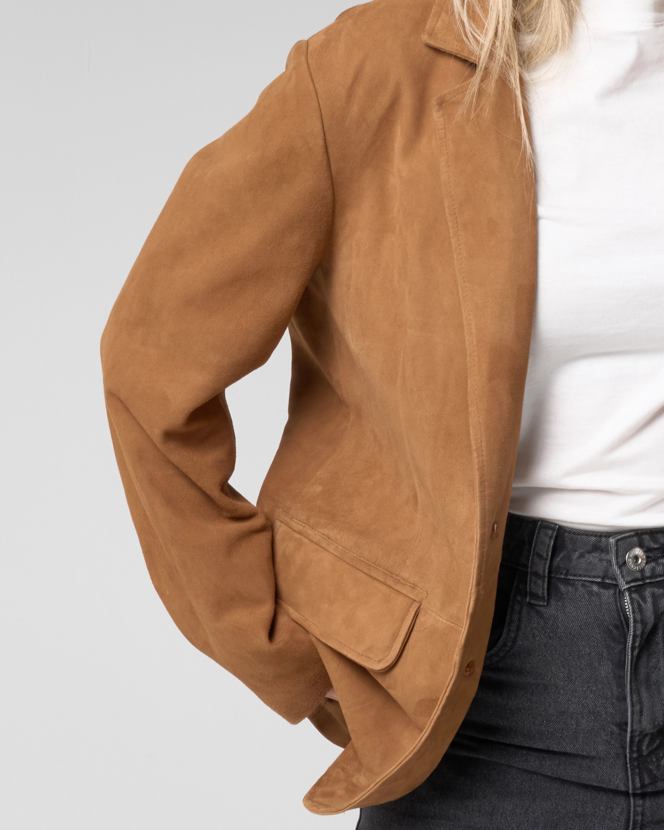 Close up detail of real suede texture on the tan blazer from Barneys Originals.